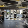 a workout room with exercise machines