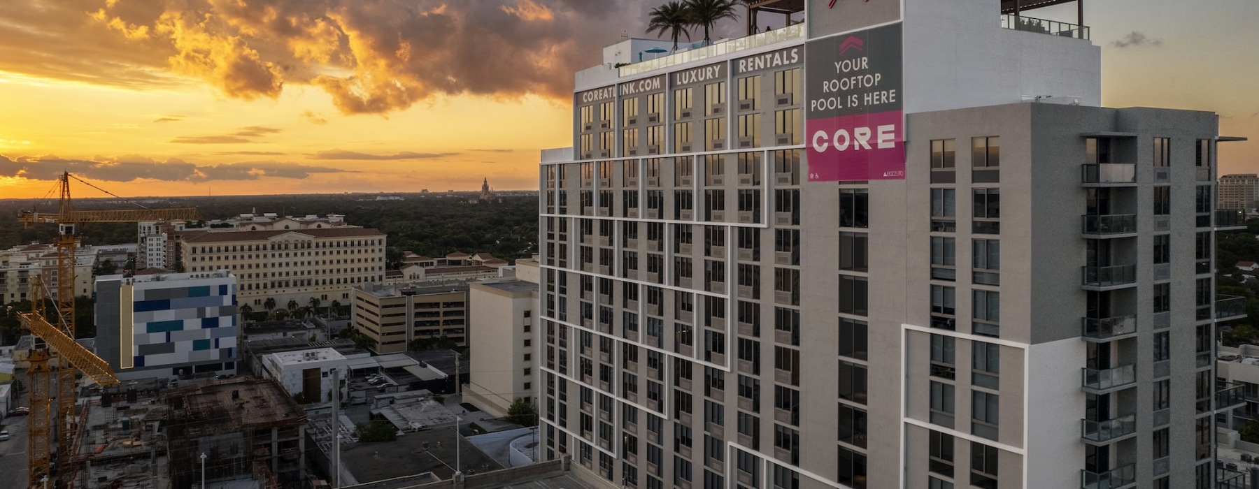 large building with several floors and view of a downtown area