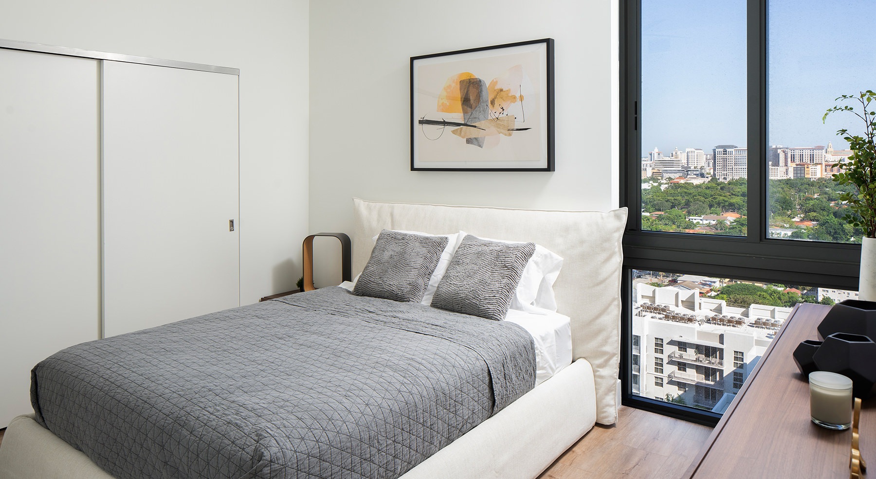 room with bed and hanging picture