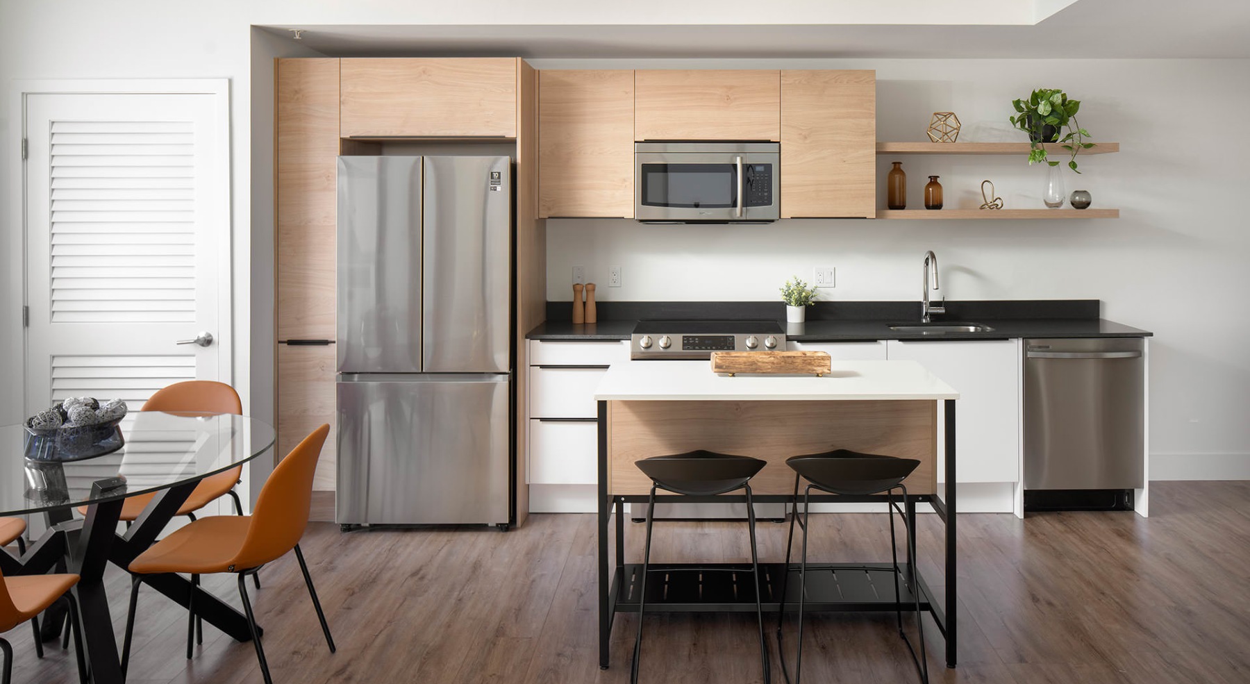 spacious kitchen next to dining area