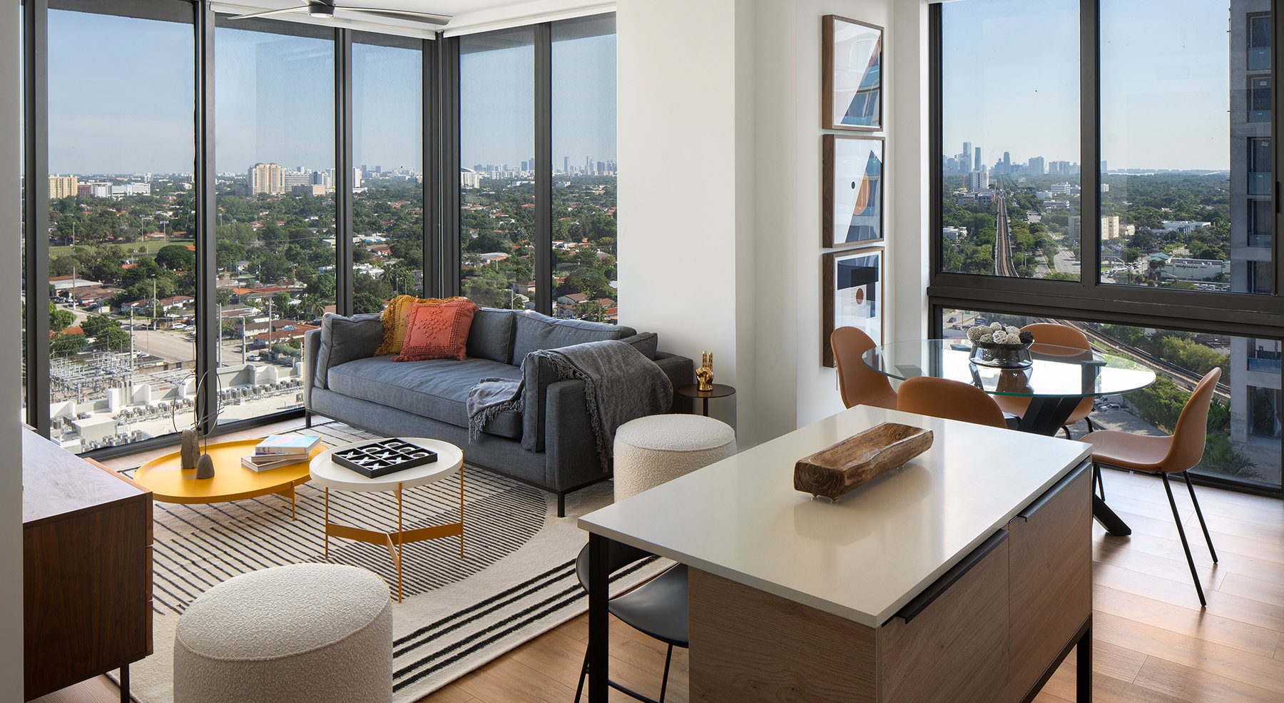 living room with wall of windows