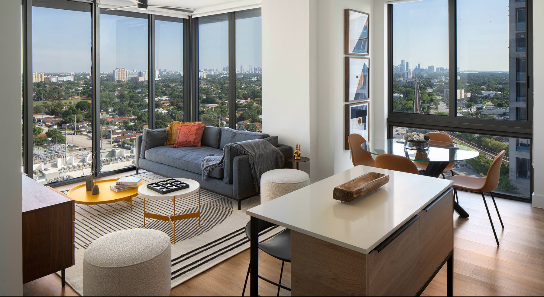 floor-to-ceiling windows surround living spaces