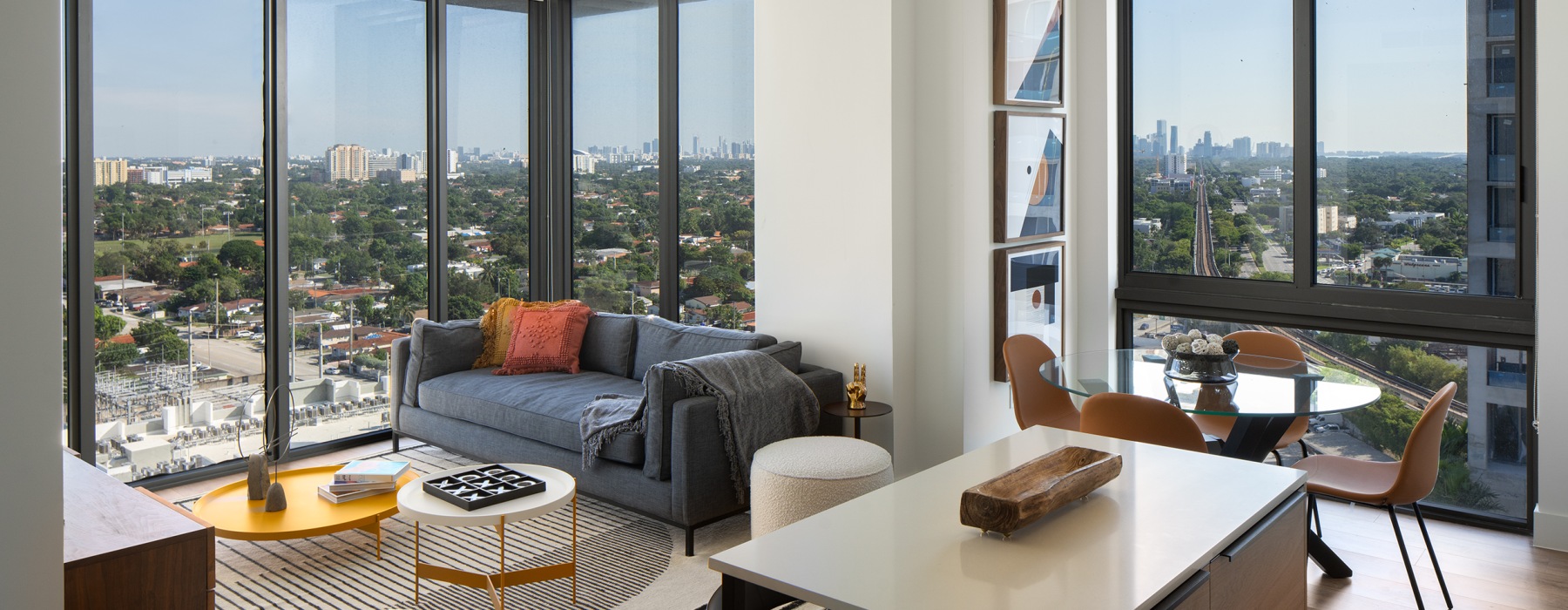 living room with wall of windows