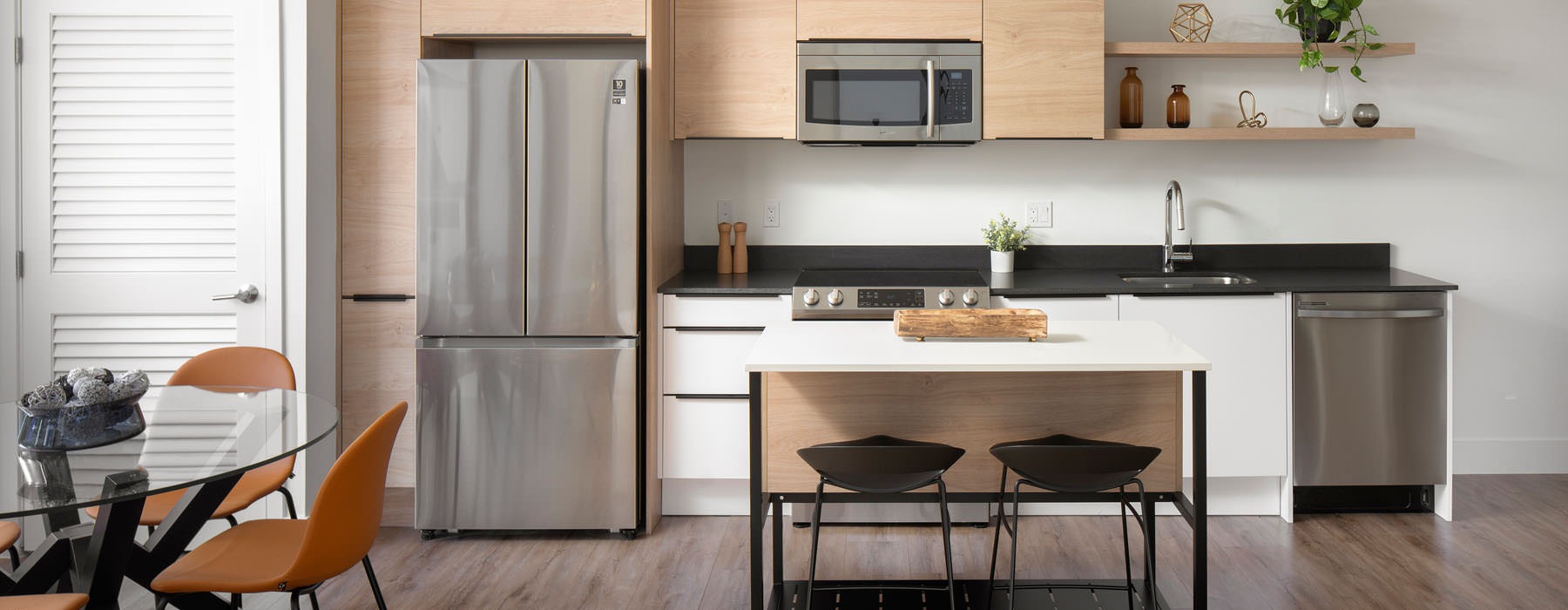 spacious kitchen next to dining area